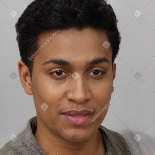 Joyful latino young-adult male with short  brown hair and brown eyes