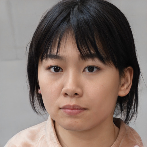 Neutral asian child female with medium  black hair and brown eyes