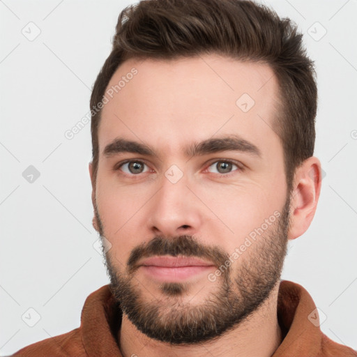 Neutral white young-adult male with short  brown hair and brown eyes