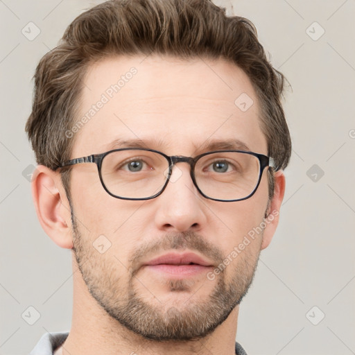 Neutral white adult male with short  brown hair and grey eyes