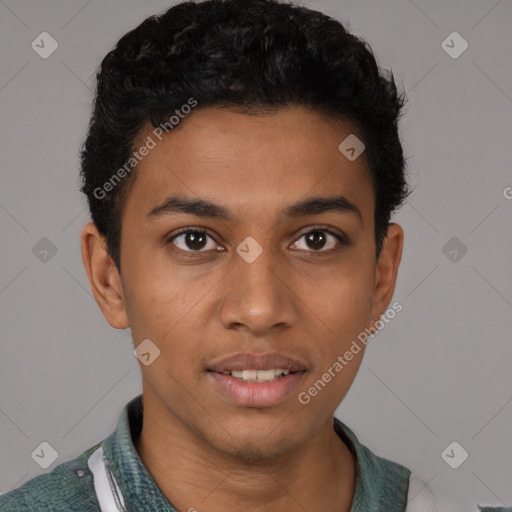 Joyful latino young-adult male with short  black hair and brown eyes