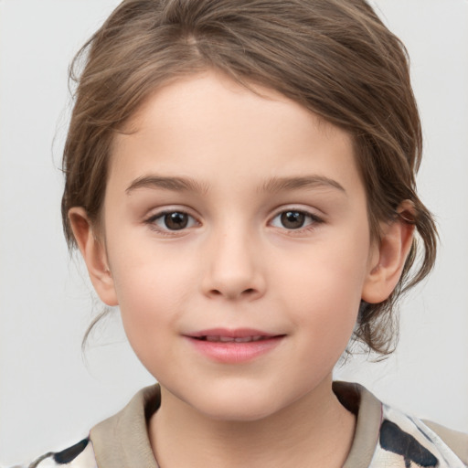 Joyful white child female with medium  brown hair and grey eyes