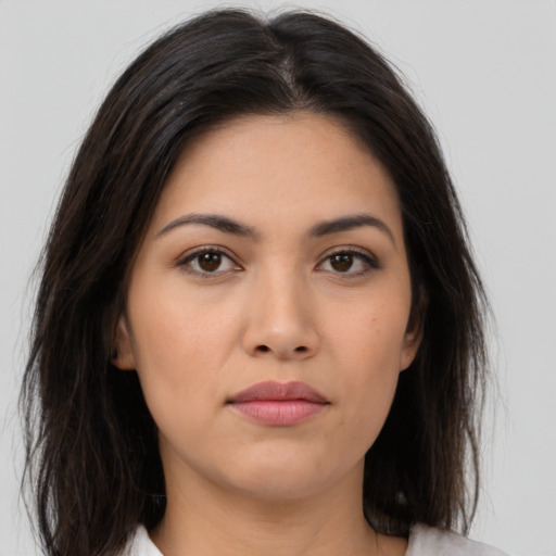 Neutral asian young-adult female with medium  brown hair and brown eyes