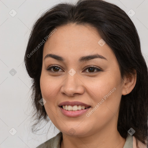 Joyful white young-adult female with long  brown hair and brown eyes