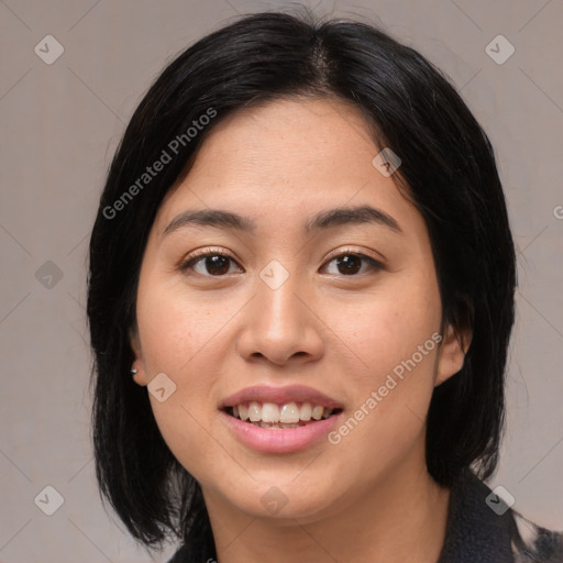 Joyful asian young-adult female with medium  black hair and brown eyes