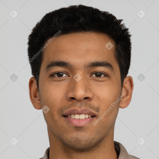 Joyful latino young-adult male with short  black hair and brown eyes