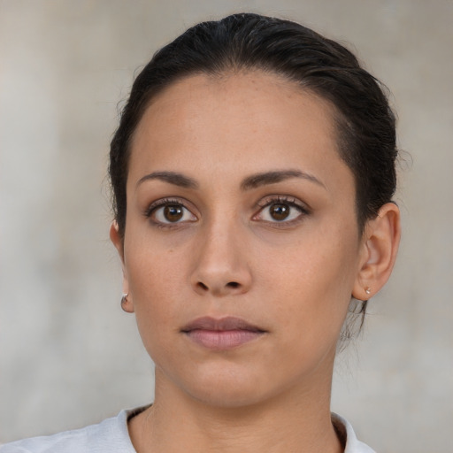 Neutral white young-adult female with short  brown hair and brown eyes