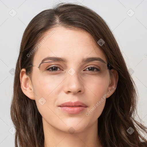 Neutral white young-adult female with long  brown hair and brown eyes