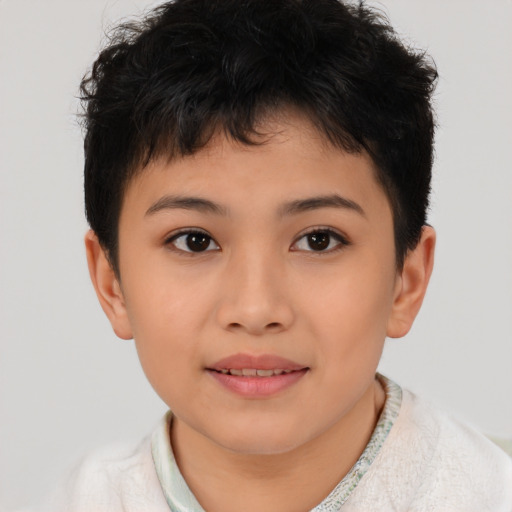 Joyful asian child female with short  brown hair and brown eyes