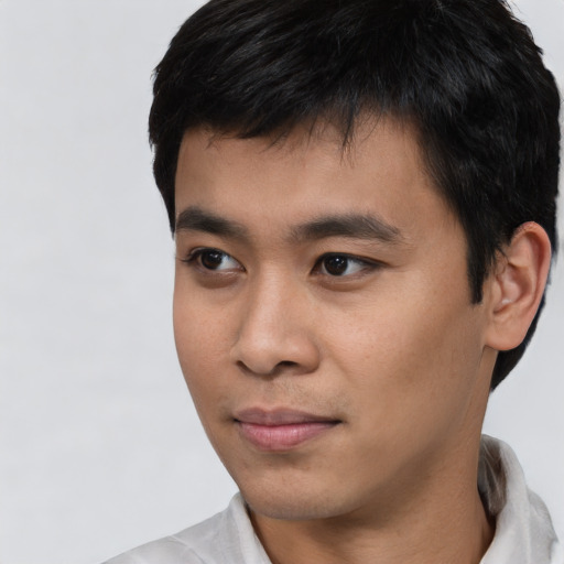 Neutral asian young-adult male with short  black hair and brown eyes