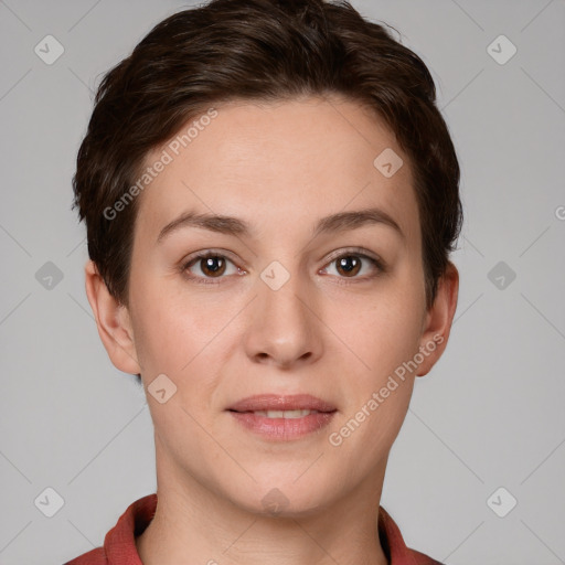 Joyful white young-adult female with short  brown hair and grey eyes