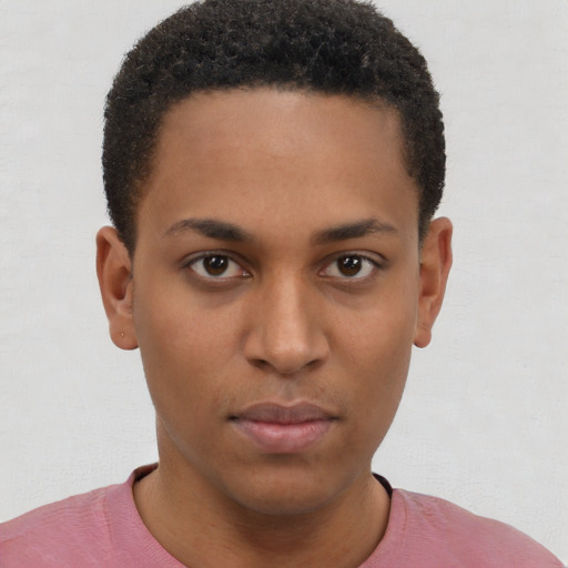 Neutral latino young-adult male with short  brown hair and brown eyes