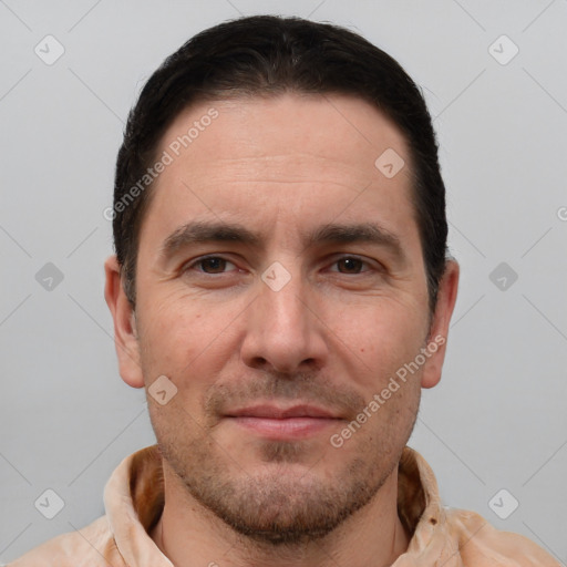 Joyful white adult male with short  brown hair and brown eyes