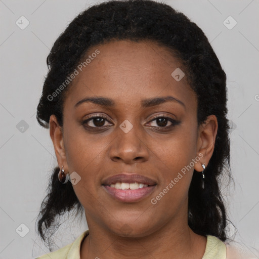 Joyful black young-adult female with medium  black hair and brown eyes