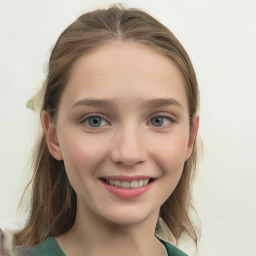 Joyful white child female with long  brown hair and green eyes