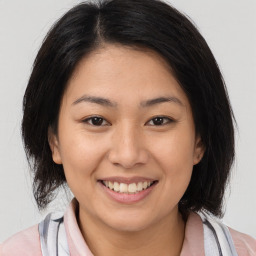 Joyful white young-adult female with medium  brown hair and brown eyes