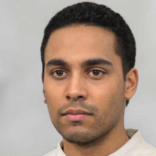 Neutral latino young-adult male with short  black hair and brown eyes