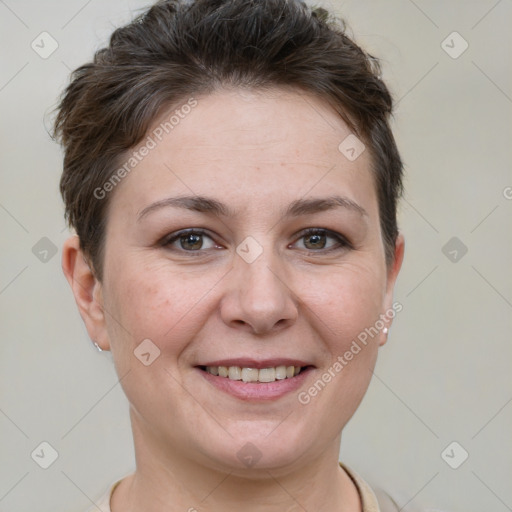 Joyful white young-adult female with short  brown hair and grey eyes