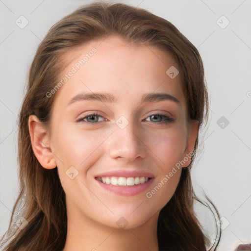 Joyful white young-adult female with long  brown hair and blue eyes