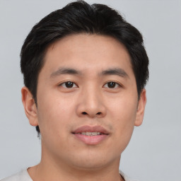 Neutral asian young-adult male with short  brown hair and brown eyes