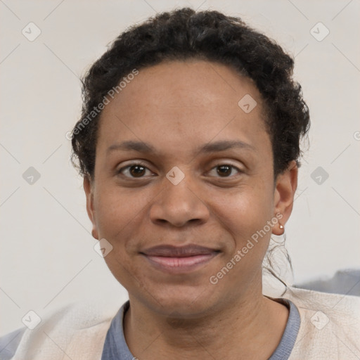 Joyful black adult female with short  brown hair and brown eyes