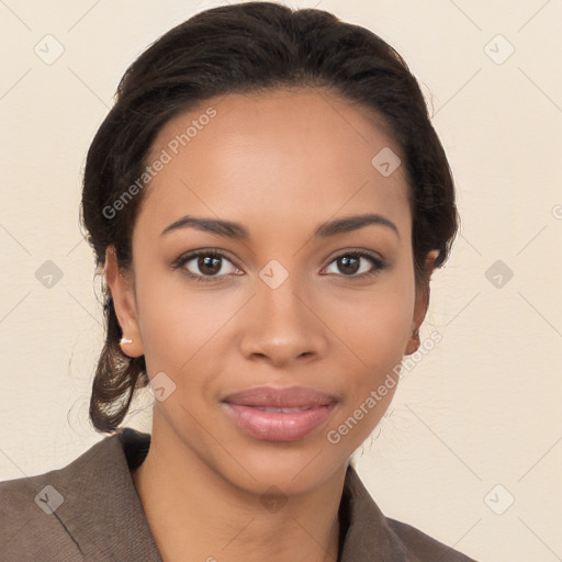 Joyful latino young-adult female with long  brown hair and brown eyes