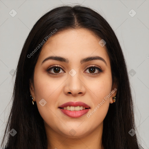 Joyful latino young-adult female with long  brown hair and brown eyes