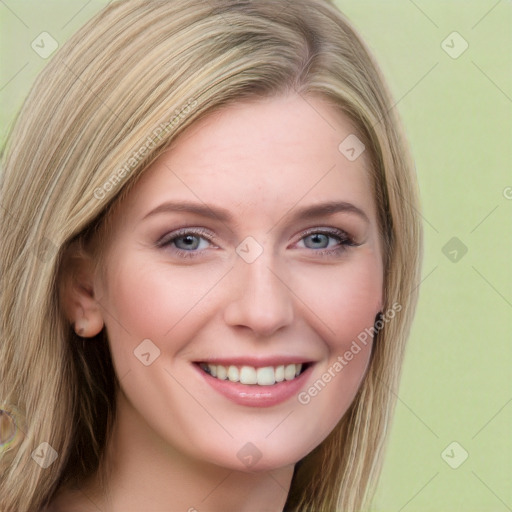 Joyful white young-adult female with long  brown hair and green eyes