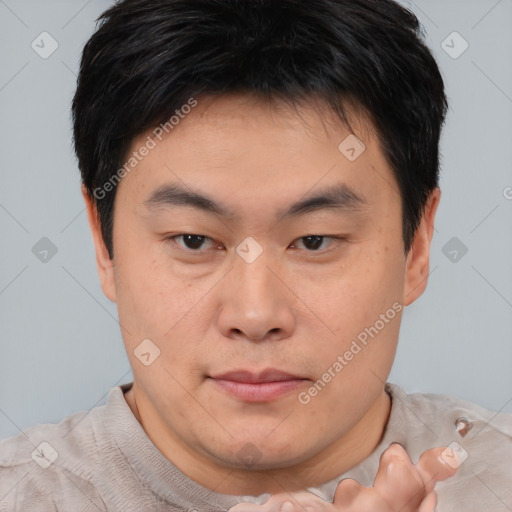 Neutral asian young-adult male with short  brown hair and brown eyes