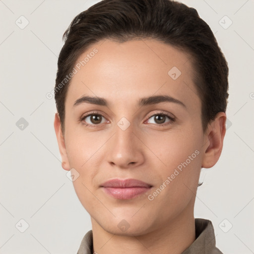 Joyful white young-adult female with short  brown hair and brown eyes