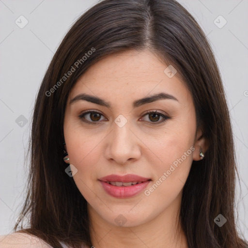 Joyful white young-adult female with long  brown hair and brown eyes