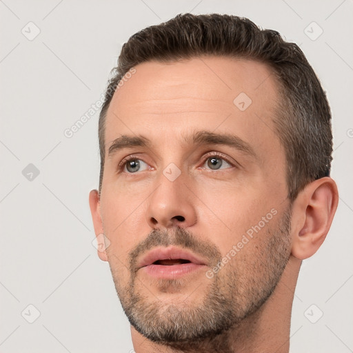 Neutral white adult male with short  brown hair and brown eyes