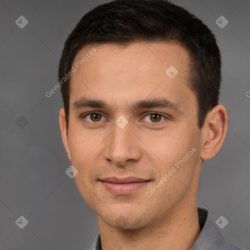 Joyful white young-adult male with short  brown hair and brown eyes