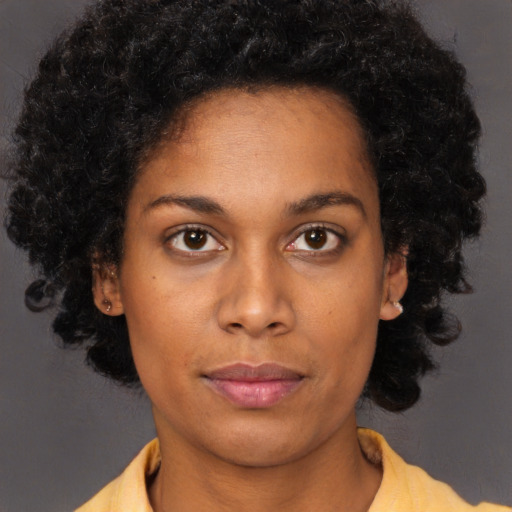 Neutral black young-adult female with short  brown hair and brown eyes