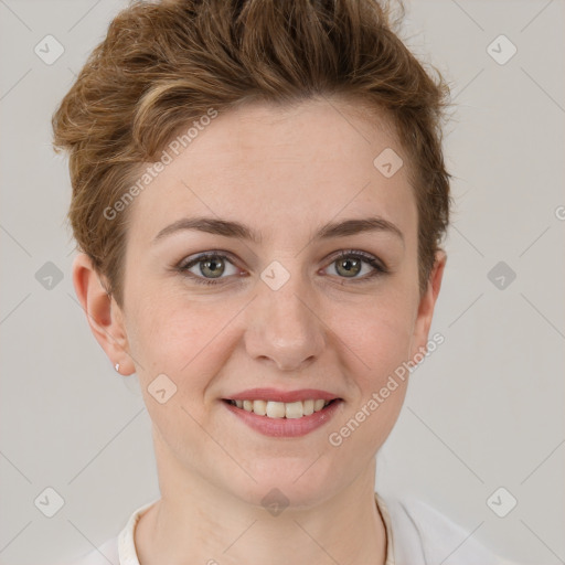 Joyful white young-adult female with short  brown hair and grey eyes