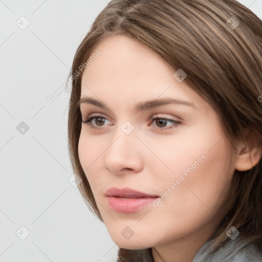 Neutral white young-adult female with long  brown hair and brown eyes