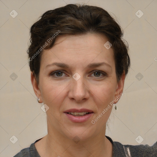 Joyful white adult female with short  brown hair and brown eyes