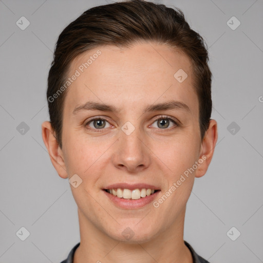 Joyful white young-adult female with short  brown hair and grey eyes