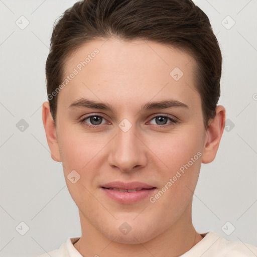 Joyful white young-adult female with short  brown hair and brown eyes