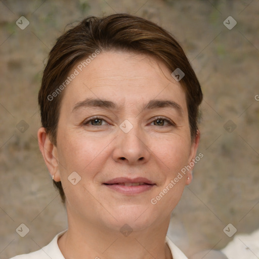 Joyful white adult female with short  brown hair and brown eyes