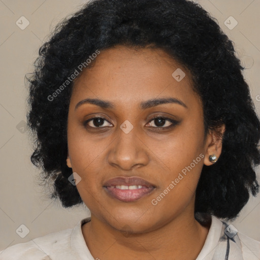 Joyful black young-adult female with medium  black hair and brown eyes