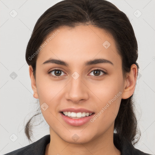 Joyful white young-adult female with medium  brown hair and brown eyes