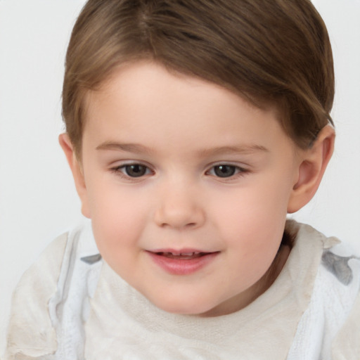 Joyful white child female with short  brown hair and brown eyes