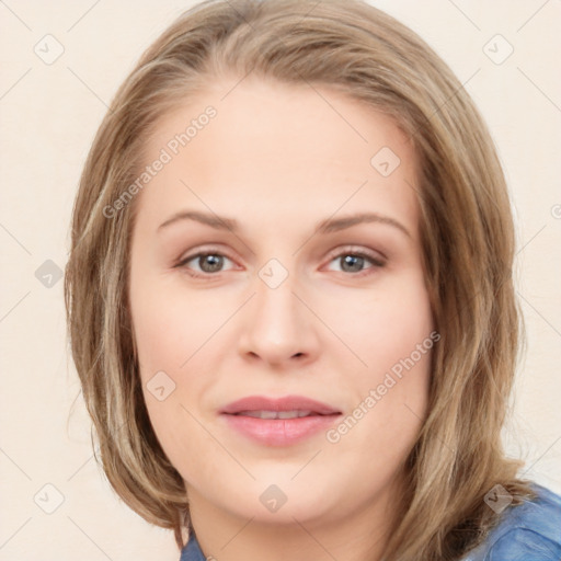 Joyful white young-adult female with medium  brown hair and blue eyes