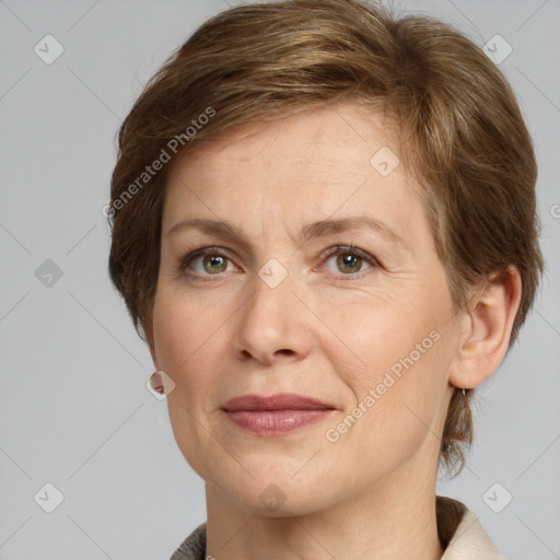 Joyful white adult female with medium  brown hair and grey eyes