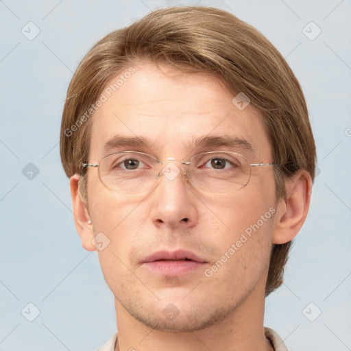 Joyful white adult male with short  brown hair and grey eyes