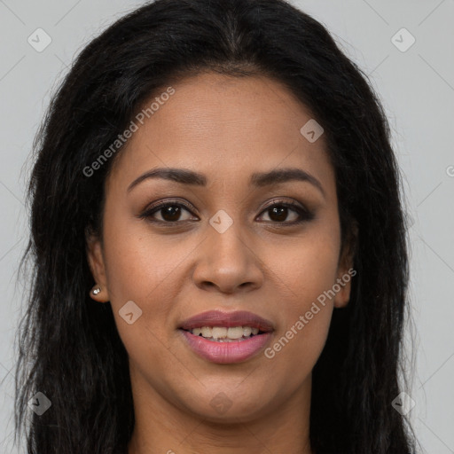 Joyful latino young-adult female with long  brown hair and brown eyes