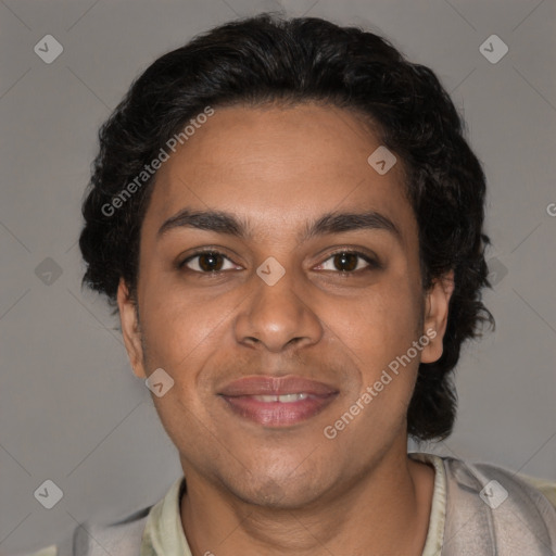 Joyful black young-adult male with short  brown hair and brown eyes