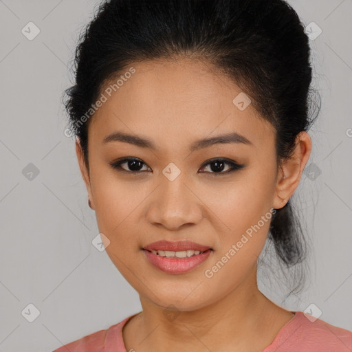 Joyful latino young-adult female with medium  brown hair and brown eyes