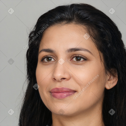 Joyful latino young-adult female with long  black hair and brown eyes